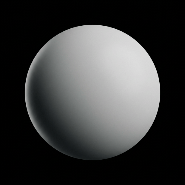 Bright glowing star with a soft halo against a black background